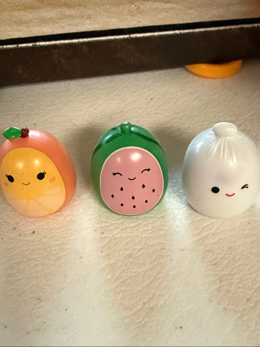 Lot of 11 small 1” collectible Squishmallows squish-a-longs & blue sun visor